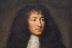 Portrait of a man with long curly dark hair, pale complexion, and a white embroidered lace collar, facing slightly to the right.
